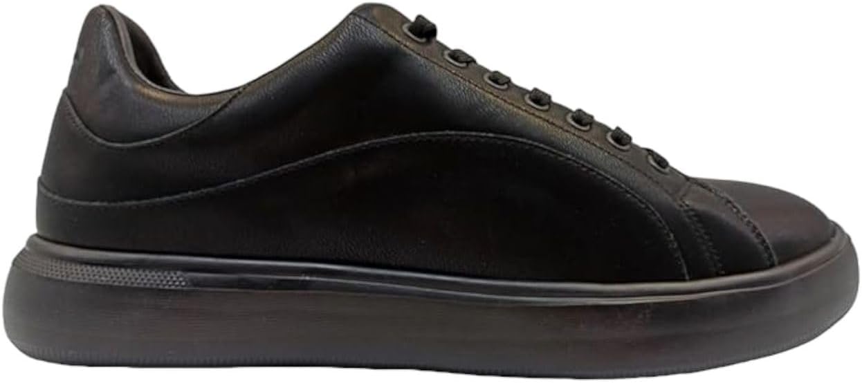 Pavo Monitor Arm installed on a wooden office desk